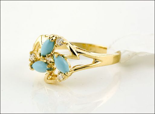 Позолоченное кольцо из мельхиора с бирюзой 18541 купить в магазине Самоцветы мира