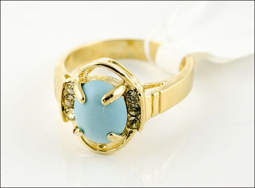 Позолоченное кольцо из мельхиора с бирюзой 19796 купить в магазине Самоцветы мира