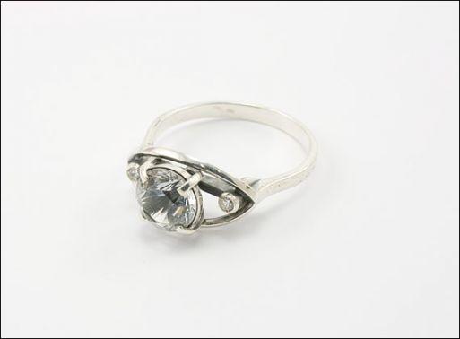 Серебряное кольцо с топазом 21099 купить в магазине Самоцветы мира