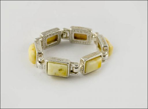 Кольцо из мельхиора с янтарём 22765 купить в магазине Самоцветы мира
