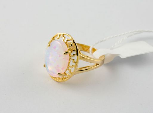 Позолоченное кольцо из мельхиора с опалом 23402 купить в магазине Самоцветы мира