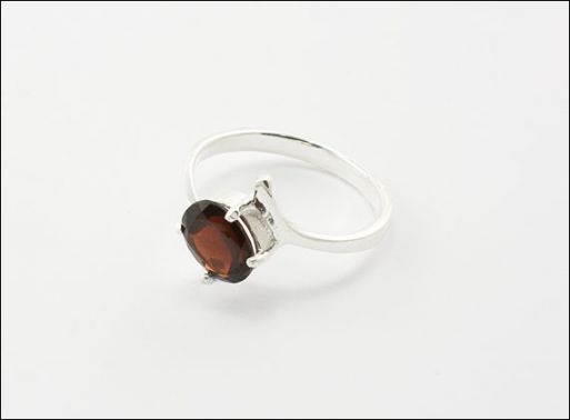 Серебряное кольцо с гранатом 29721 купить в магазине Самоцветы мира