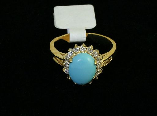 Позолоченное кольцо из мельхиора с бирюзой и фианитами 30674 купить в магазине Самоцветы мира