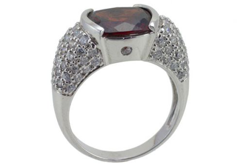 Серебряное кольцо с гранатом и фианитами 42775 купить в магазине Самоцветы мира