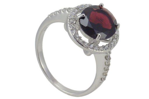 Серебряное кольцо с гранатом и фианитами 43792 купить в магазине Самоцветы мира
