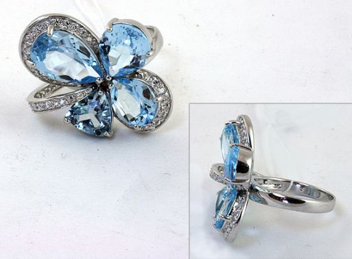 Серебряное кольцо с топазом и фианитами 43875 купить в магазине Самоцветы мира