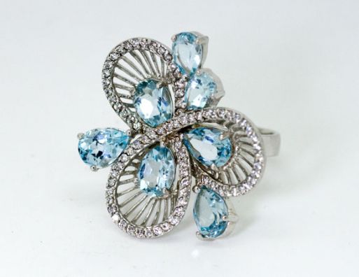Серебряное кольцо с топазом и фианитами 43897 купить в магазине Самоцветы мира