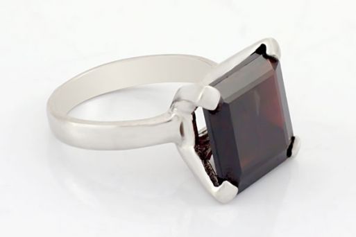 Серебряное кольцо с гранатом 45203 купить в магазине Самоцветы мира