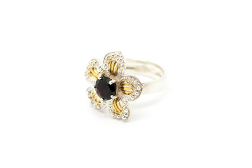 Серебряное кольцо с гранатом 50052 купить в магазине Самоцветы мира