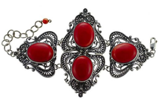 Серебряный браслет с красным кораллом ручной работы овалы 50667 купить в магазине Самоцветы мира