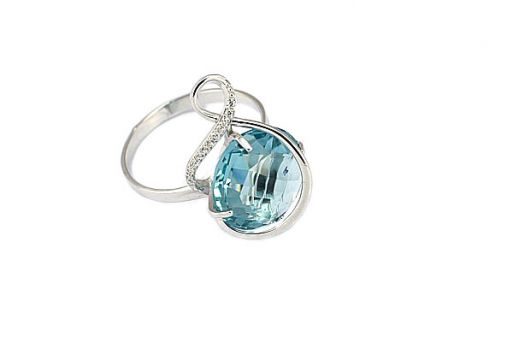 Серебряное кольцо с топазом и фианитами 52488 купить в магазине Самоцветы мира