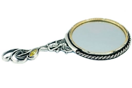 Серебряное зеркальце Афродита диаметром 55 мм с ручкой в виде женского профиля.