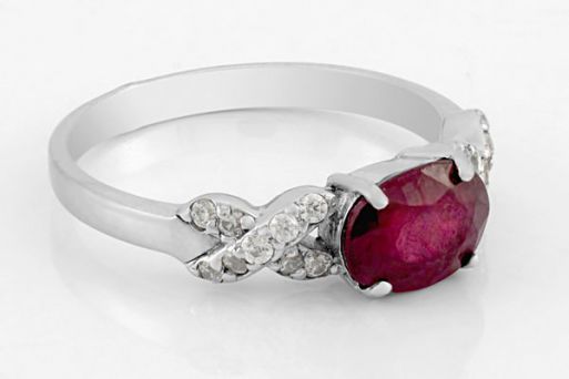 Серебряное кольцо с рубином и фианитами 52867 купить в магазине Самоцветы мира