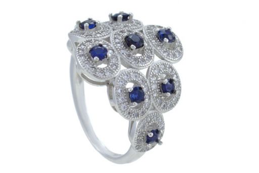 Серебряное кольцо с сапфиром и фианитами 52917 купить в магазине Самоцветы мира