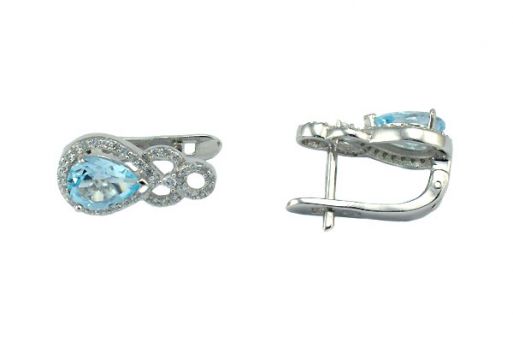 Серебряное кольцо с топазом и фианитами 52944 купить в магазине Самоцветы мира