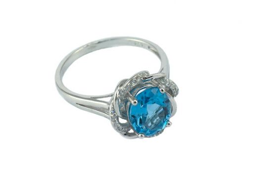 Серебряное кольцо с топазом и фианитами 52952 купить в магазине Самоцветы мира