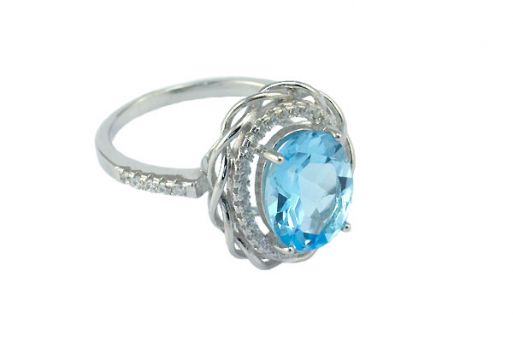 Серебряное кольцо с топазом и фианитами 52958 купить в магазине Самоцветы мира