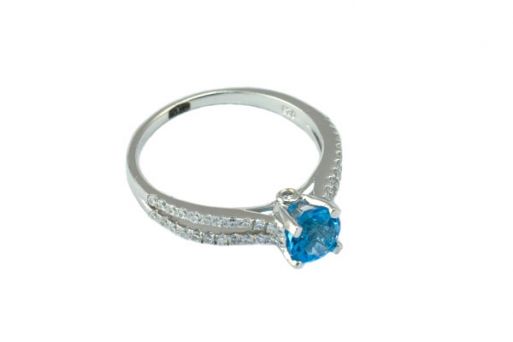 Серебряное кольцо с топазом и фианитами 52975 купить в магазине Самоцветы мира