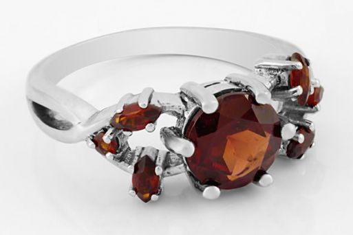 Серебряное кольцо с гранатом 54464 купить в магазине Самоцветы мира