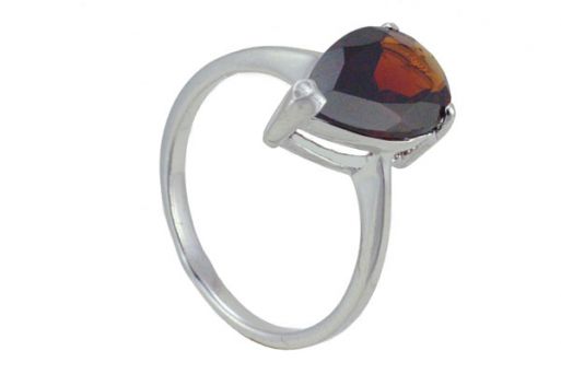 Серебряное кольцо с гранатом 56821 купить в магазине Самоцветы мира