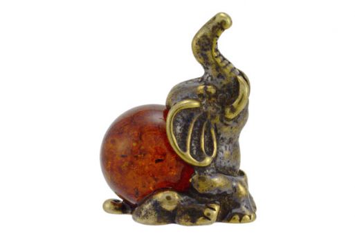 Фигурка из бронзы «Слон с поднятым хоботом» на подставке из янтаря.