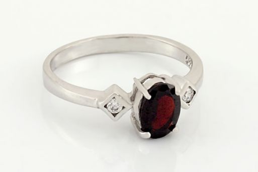 Серебряное кольцо с гранатом и фианитами 58543 купить в магазине Самоцветы мира