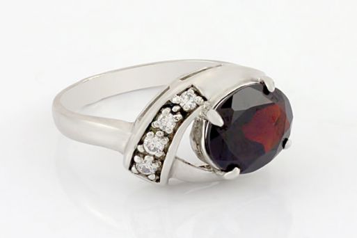 Серебряное кольцо с гранатом и фианитами 59338 купить в магазине Самоцветы мира