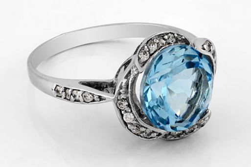Серебряное кольцо с топазом и фианитами 59521 купить в магазине Самоцветы мира