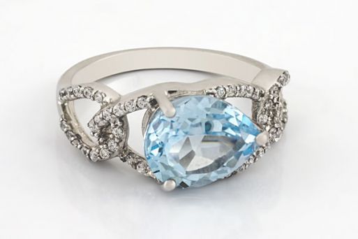 Серебряное кольцо с топазом и фианитами 59523 купить в магазине Самоцветы мира
