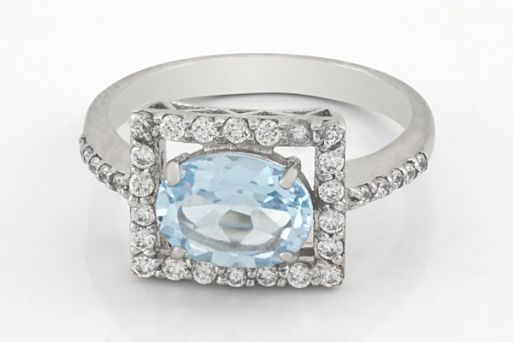 Серебряное кольцо с топазом и фианитами 59531 купить в магазине Самоцветы мира