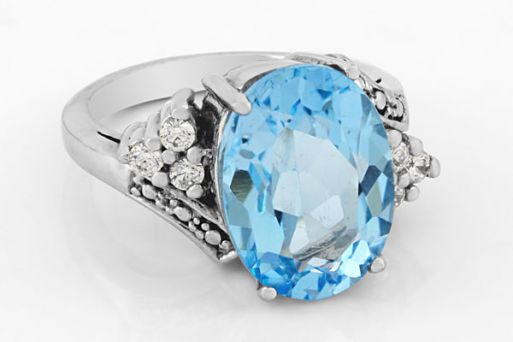 Серебряное кольцо с топазом и фианитами 60311 купить в магазине Самоцветы мира