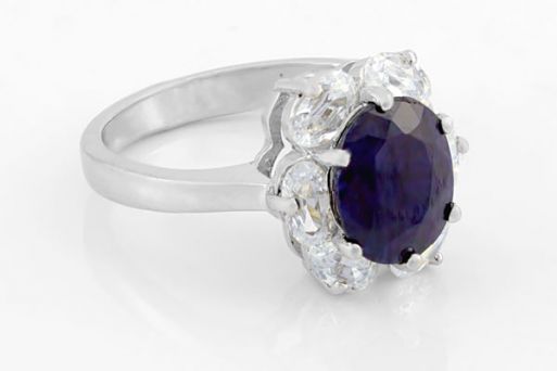 Серебряное кольцо с сапфиром и фианитами 61675 купить в магазине Самоцветы мира
