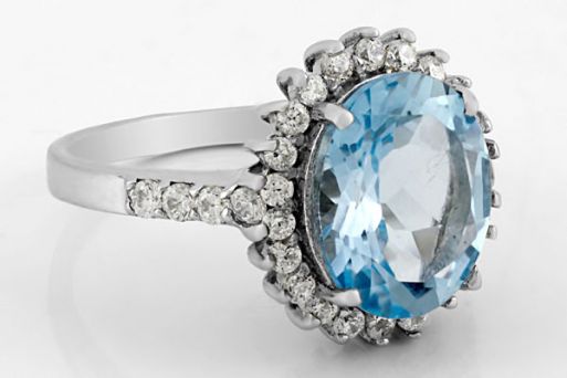 Серебряное кольцо с топазом и фианитами 61751 купить в магазине Самоцветы мира