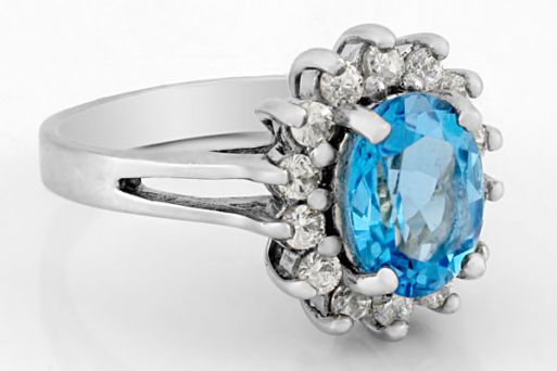 Серебряное кольцо с топазом и фианитами 61752 купить в магазине Самоцветы мира