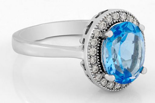 Серебряное кольцо с топазом и фианитами 61758 купить в магазине Самоцветы мира
