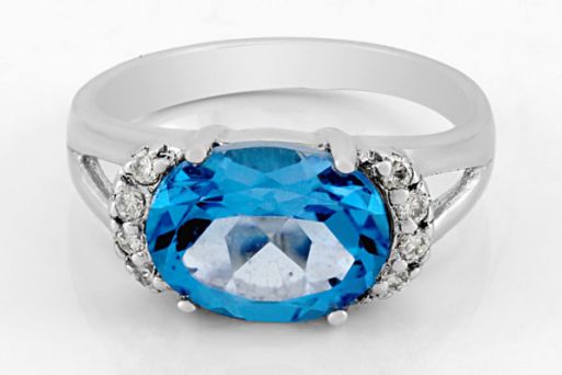 Серебряное кольцо с топазом и фианитами 61759 купить в магазине Самоцветы мира