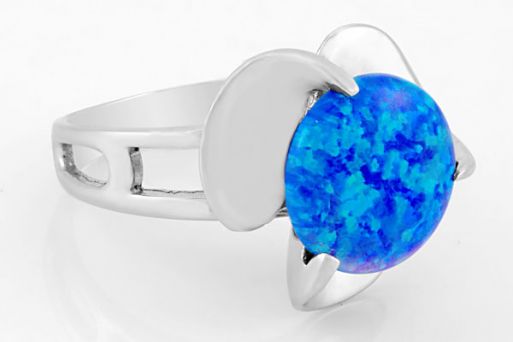 Серебряное кольцо с опалом 62066 купить в магазине Самоцветы мира