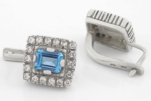 Серебряное кольцо с топазом и фианитами 8806 купить в магазине Самоцветы мира