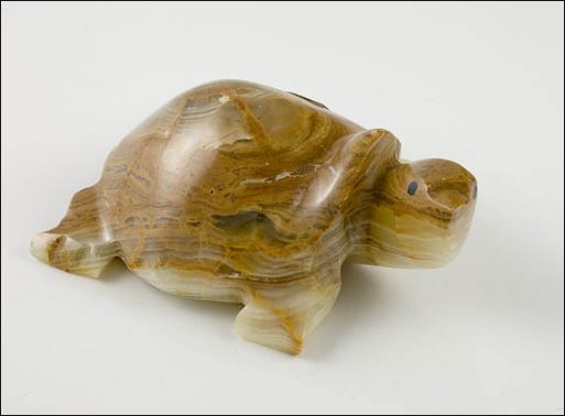 Фигурка из оникса черепаха 100х50х25 мм./Самоцветы мира/