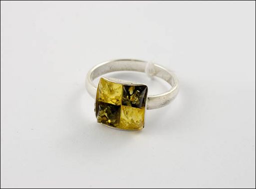 Кольцо из мельхиора с янтарём 9705 купить в магазине Самоцветы мира