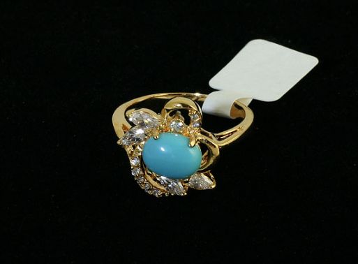 Позолоченное кольцо из мельхиора с бирюзой 44366 купить в магазине Самоцветы мира