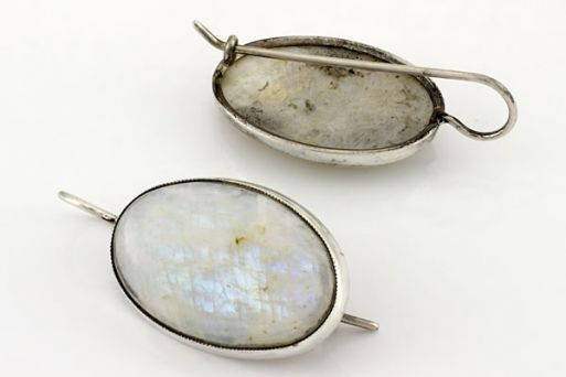 Серебряные серьги с беломоритом 64464 купить в магазине Самоцветы мира