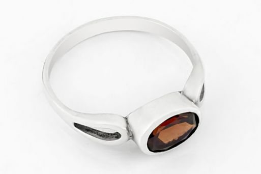 Серебряное кольцо с гранатом 65430 купить в магазине Самоцветы мира
